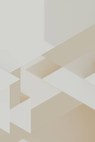 Geometric shapes create an abstract, minimalist composition.