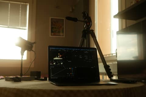 Laptop set up for video editing.