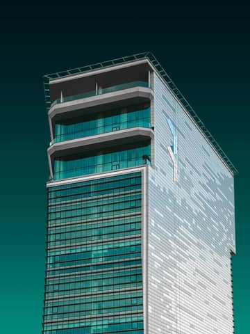 A tall building with a sky background